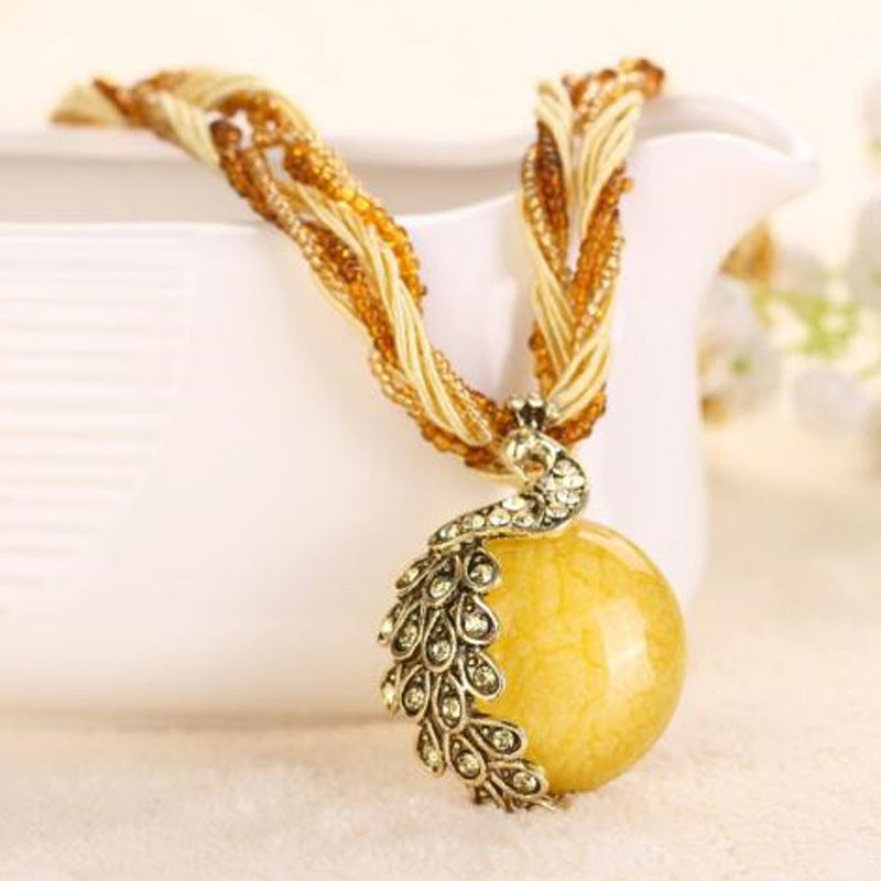 European and American ethnic style imitation beeswax colored shell long sweater chain autumn and winter retro water drop necklace jewelry wholesale