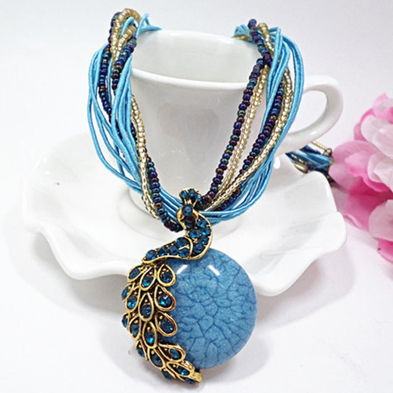 European and American ethnic style imitation beeswax colored shell long sweater chain autumn and winter retro water drop necklace jewelry wholesale