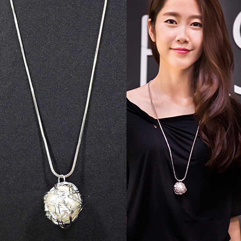 European and American ethnic style imitation beeswax colored shell long sweater chain autumn and winter retro water drop necklace jewelry wholesale