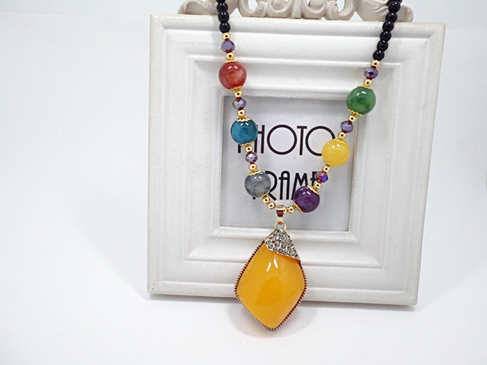 European and American ethnic style imitation beeswax color shell long sweater chain autumn and winter retro water drop necklace jewelry wholesale