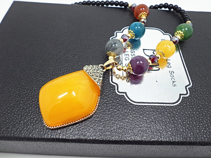 European and American ethnic style imitation beeswax color shell long sweater chain autumn and winter retro water drop necklace jewelry wholesale
