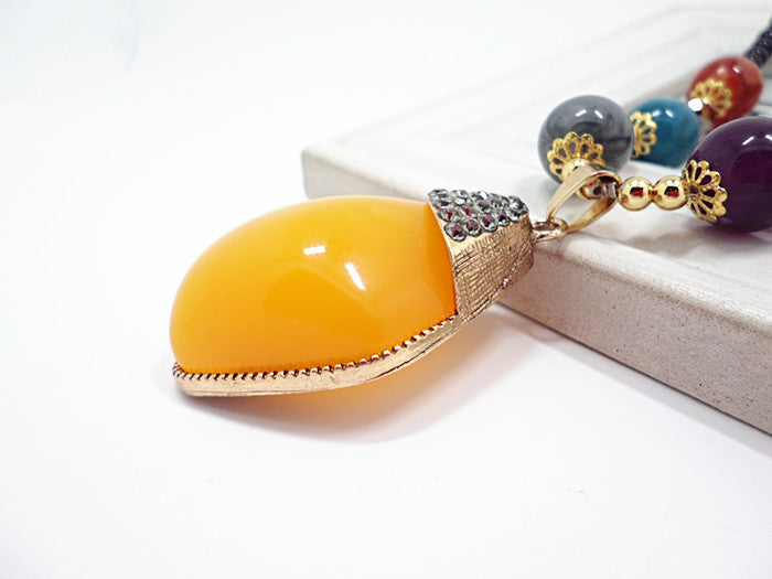 European and American ethnic style imitation beeswax color shell long sweater chain autumn and winter retro water drop necklace jewelry wholesale