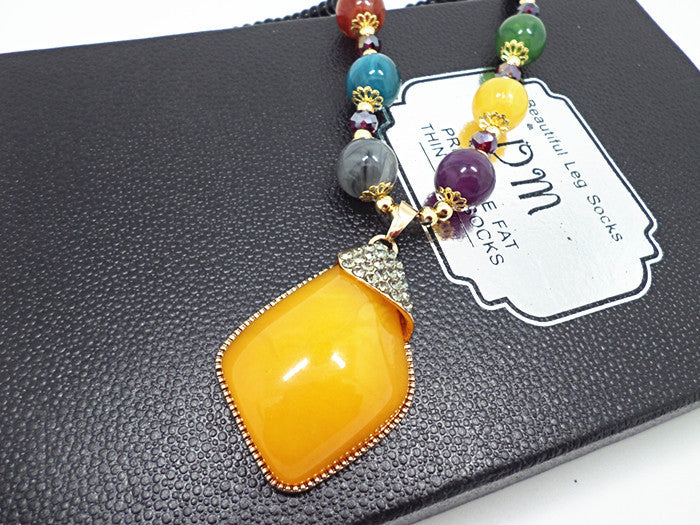 European and American ethnic style imitation beeswax color shell long sweater chain autumn and winter retro water drop necklace jewelry wholesale