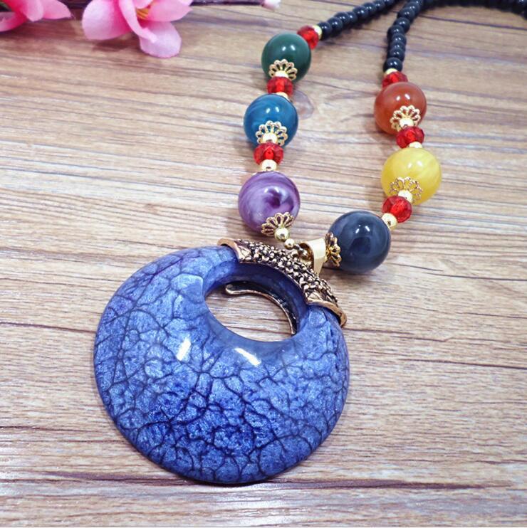 European and American ethnic style imitation beeswax colored shell long sweater chain autumn and winter retro water drop necklace jewelry wholesale