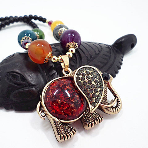 European and American ethnic style imitation beeswax colored shell long sweater chain autumn and winter retro water drop necklace jewelry wholesale