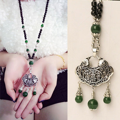 European and American ethnic style imitation beeswax colored shell long sweater chain autumn and winter retro water drop necklace jewelry wholesale