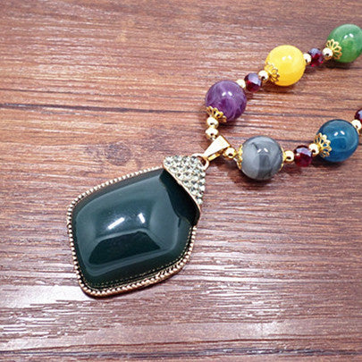 European and American ethnic style imitation beeswax colored shell long sweater chain autumn and winter retro water drop necklace jewelry wholesale