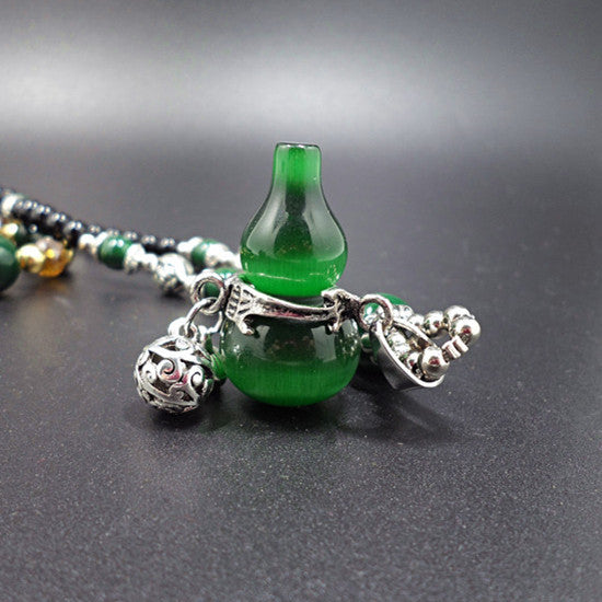 European and American ethnic style imitation beeswax colored shell long sweater chain autumn and winter retro water drop necklace jewelry wholesale