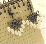 European and American ethnic style imitation beeswax color shell long sweater chain autumn and winter retro water drop necklace jewelry wholesale