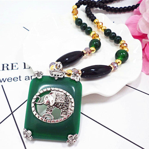 European and American ethnic style imitation beeswax colored shell long sweater chain autumn and winter retro water drop necklace jewelry wholesale