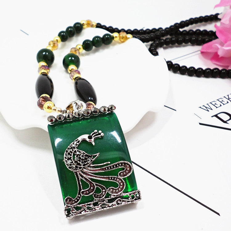 European and American ethnic style imitation beeswax colored shell long sweater chain autumn and winter retro water drop necklace jewelry wholesale