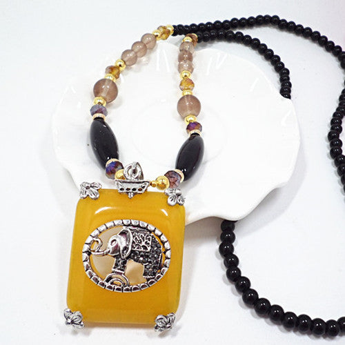 European and American ethnic style imitation beeswax colored shell long sweater chain autumn and winter retro water drop necklace jewelry wholesale