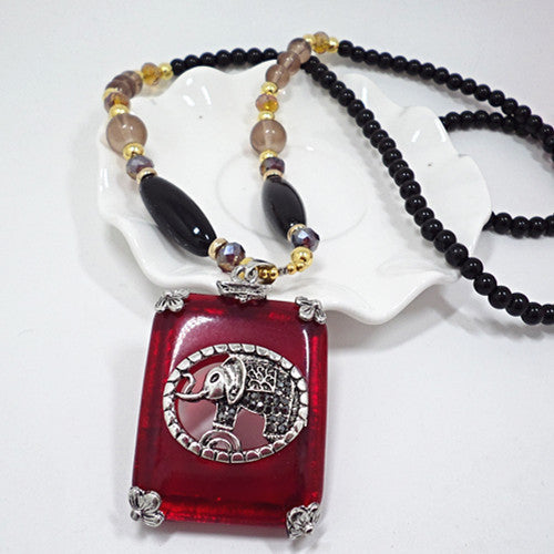 European and American ethnic style imitation beeswax colored shell long sweater chain autumn and winter retro water drop necklace jewelry wholesale