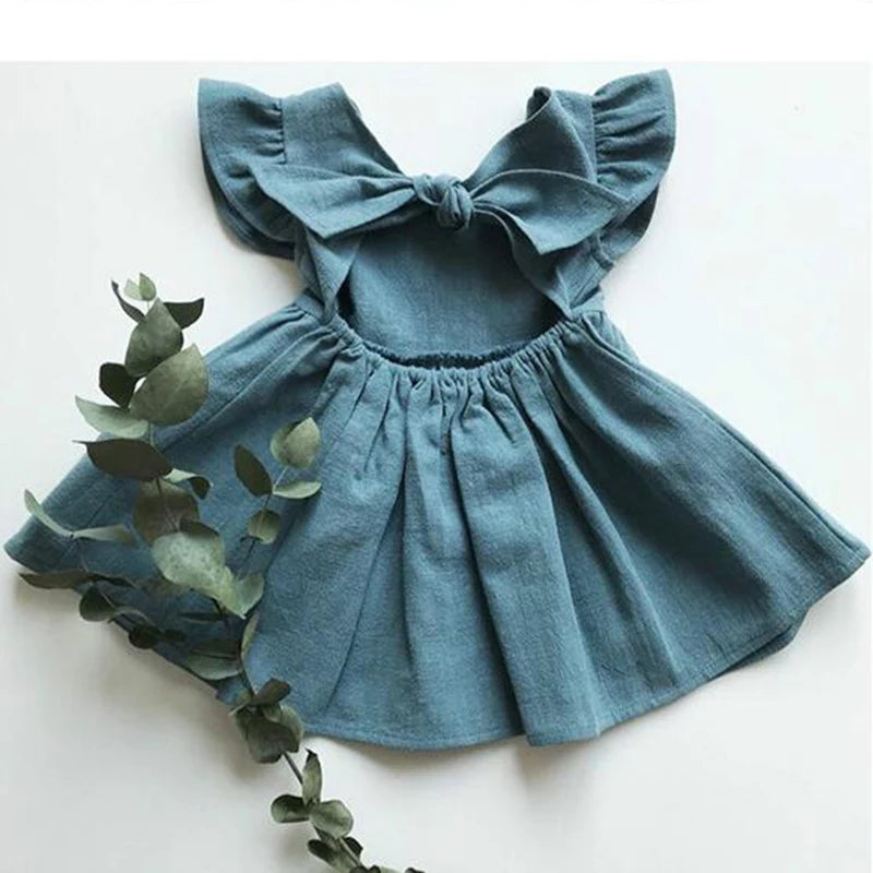 Le ragazze infantili estive in stile coreano vestono i vestiti da festa per bambini in cotone e lino con maniche volanti