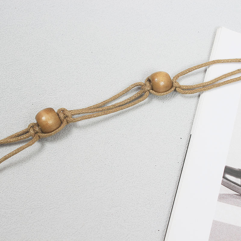 Cintura Etnica Intrecciata con Conchiglie e Nappine - Donna