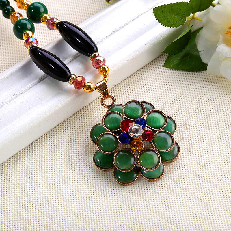 European and American ethnic style imitation beeswax colored shell long sweater chain autumn and winter retro water drop necklace jewelry wholesale