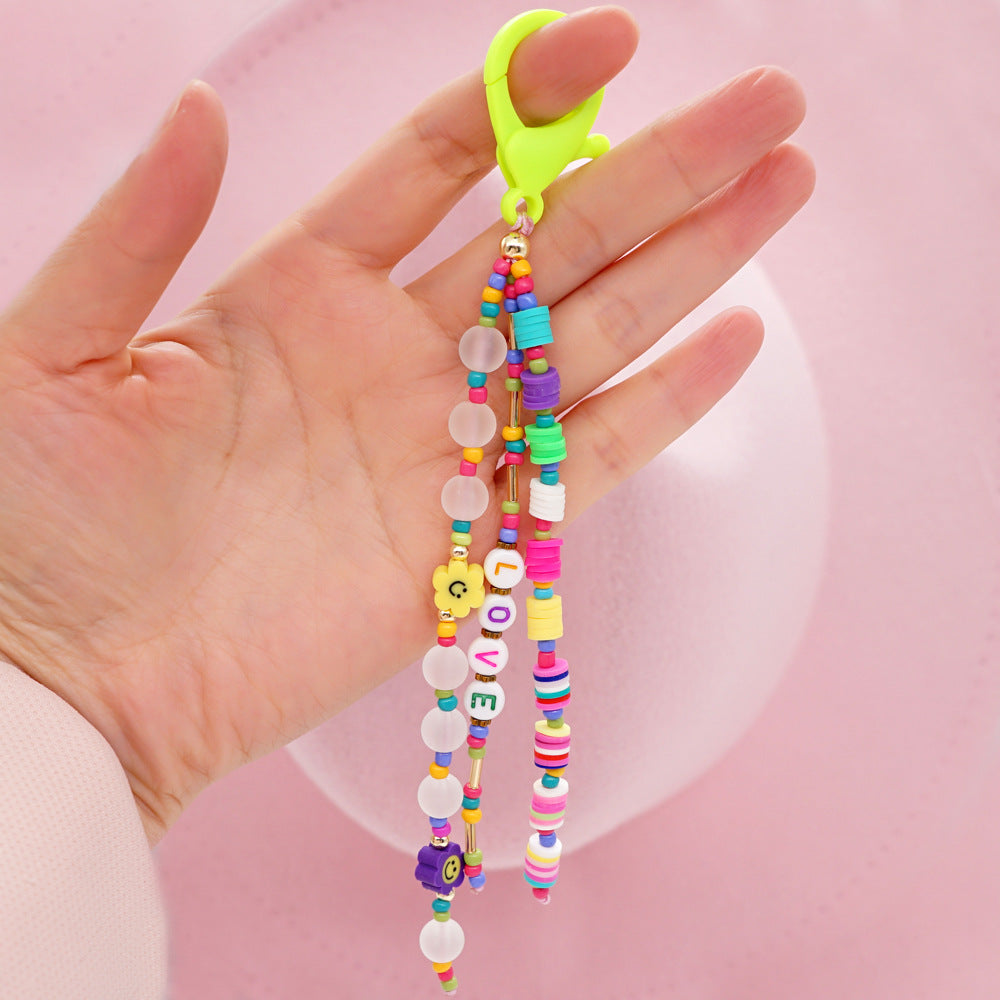 Factory direct supply handmade beaded mobile phone lanyard, Bluetooth speaker lanyard, flashlight, fan, selfie stick, U-disk sling