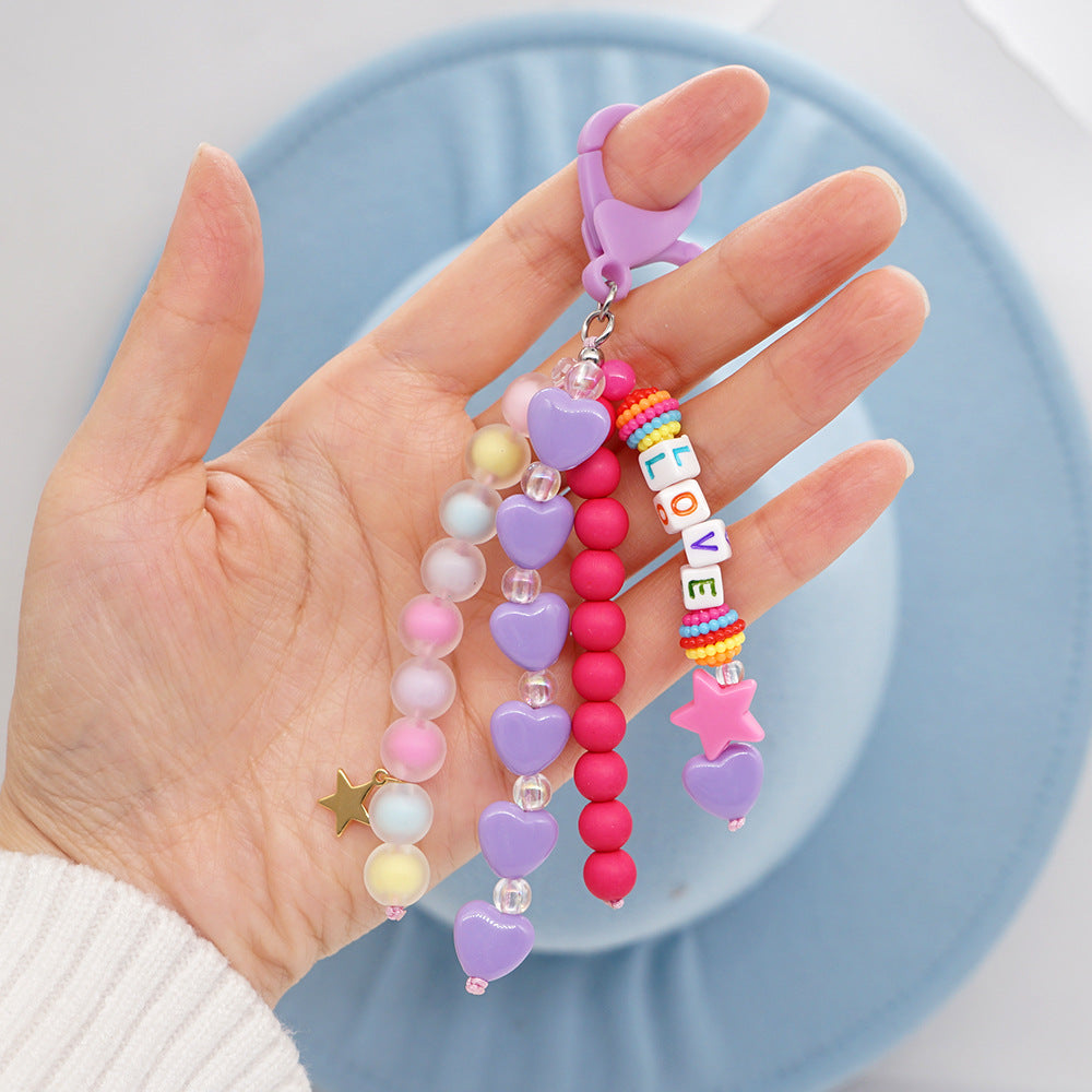 Factory direct supply handmade beaded mobile phone lanyard, Bluetooth speaker lanyard, flashlight, fan, selfie stick, U-disk sling