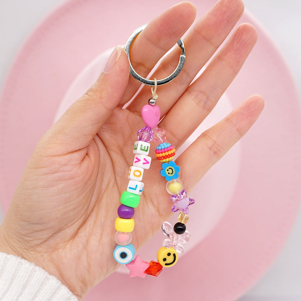 Factory direct supply handmade beaded mobile phone lanyard, Bluetooth speaker lanyard, flashlight, fan, selfie stick, U-disk sling