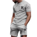 Nuovo set sportivo da uomo 2026 di tendenza: T-shirt a maniche corte e pantaloni per corsa e fitness, ideale per l'estate