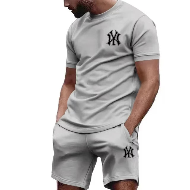 Nuovo set sportivo da uomo 2026 di tendenza: T-shirt a maniche corte e pantaloni per corsa e fitness, ideale per l'estate