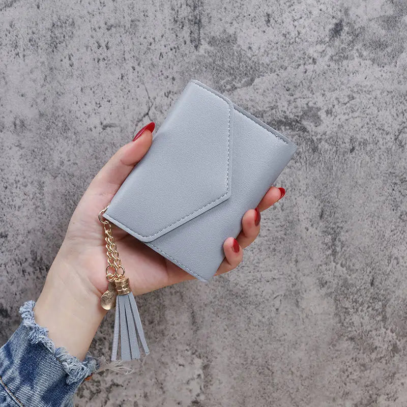 Nuovo portafoglio compatto da donna con pochette Portamonete ultrasottile portatile in pelle PU con porta carte di credito con nappa Portafoglio corto da donna