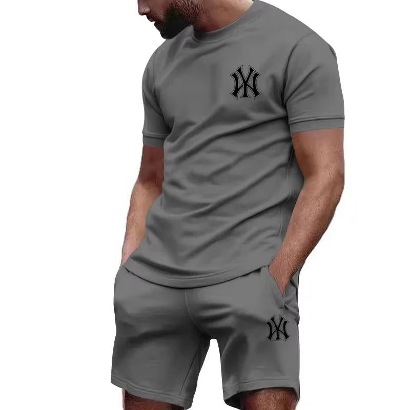 Nuovo set sportivo da uomo 2026 di tendenza: T-shirt a maniche corte e pantaloni per corsa e fitness, ideale per l'estate