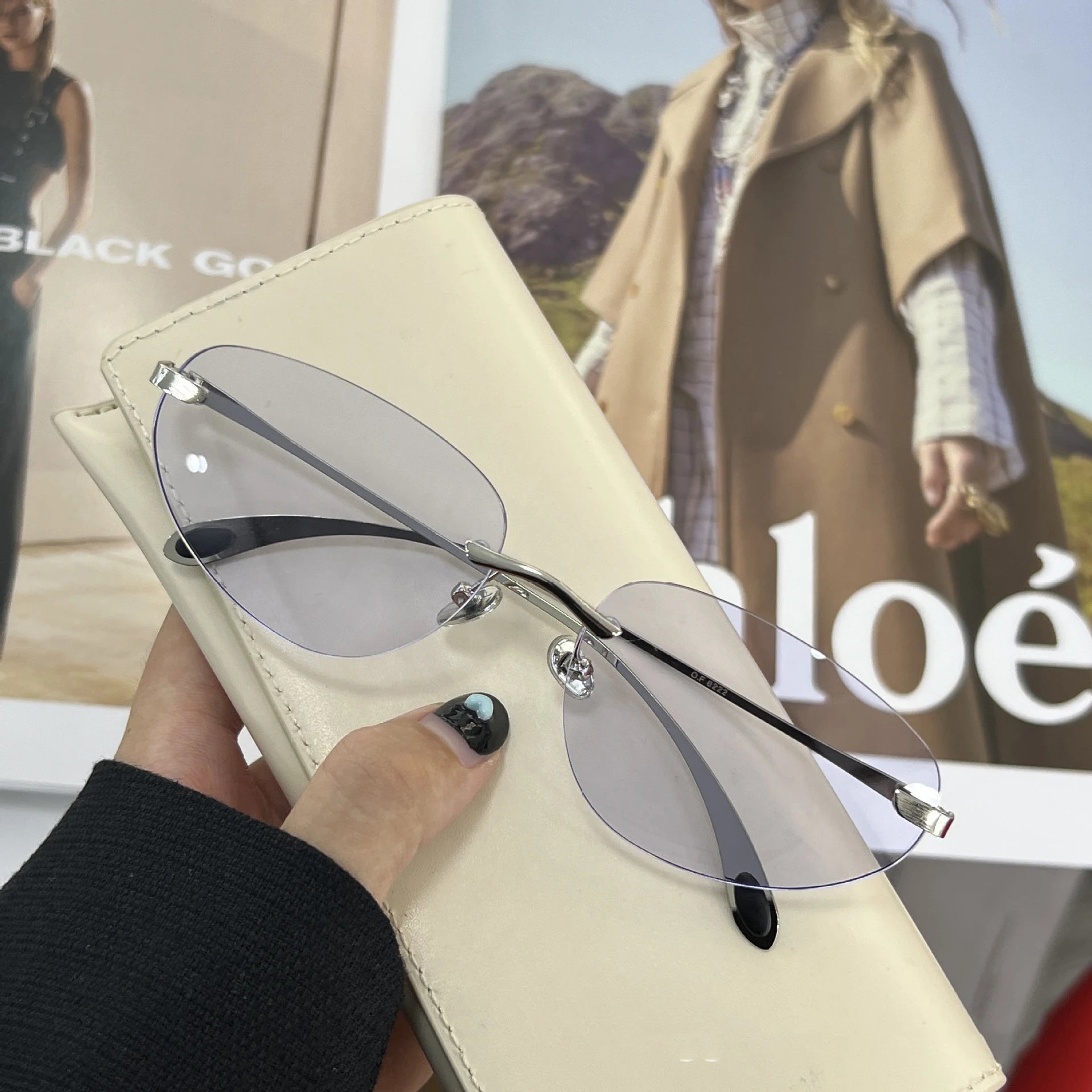 Occhiali da sole senza montatura Y2K da donna Occhiali da sole senza montatura di marca di lusso Futuro stili coreani Cat Eye Occhiali UV400 Occhiali alla moda