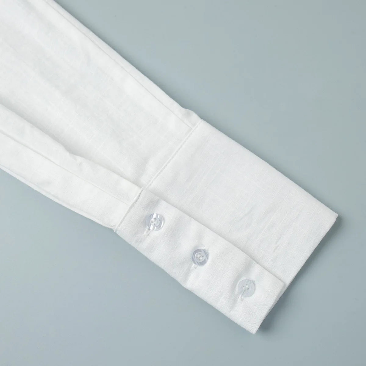 Abito chemisier casual da donna tinta unita con lacci, estivo, con risvolto, maniche lunghe, bottoni, mini abito plissettato, copricostume da spiaggia, outfit per vacanze 2026