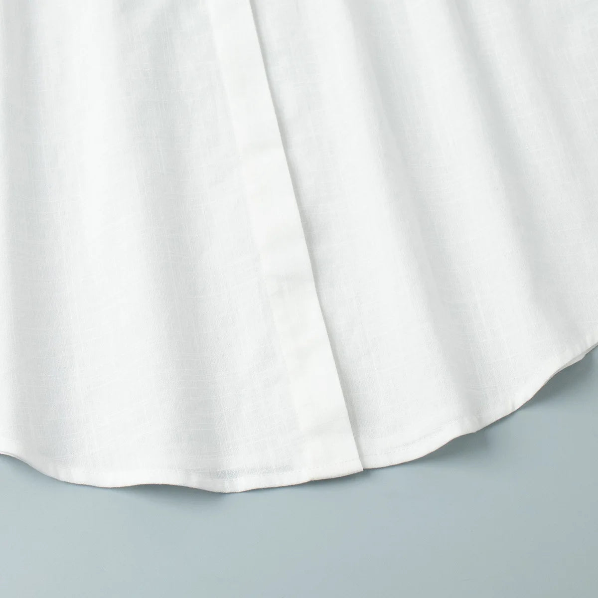 Abito chemisier casual da donna tinta unita con lacci, estivo, con risvolto, maniche lunghe, bottoni, mini abito plissettato, copricostume da spiaggia, outfit per vacanze 2026