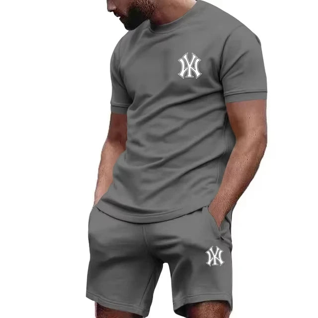 Nuovo set sportivo da uomo 2026 di tendenza: T-shirt a maniche corte e pantaloni per corsa e fitness, ideale per l'estate