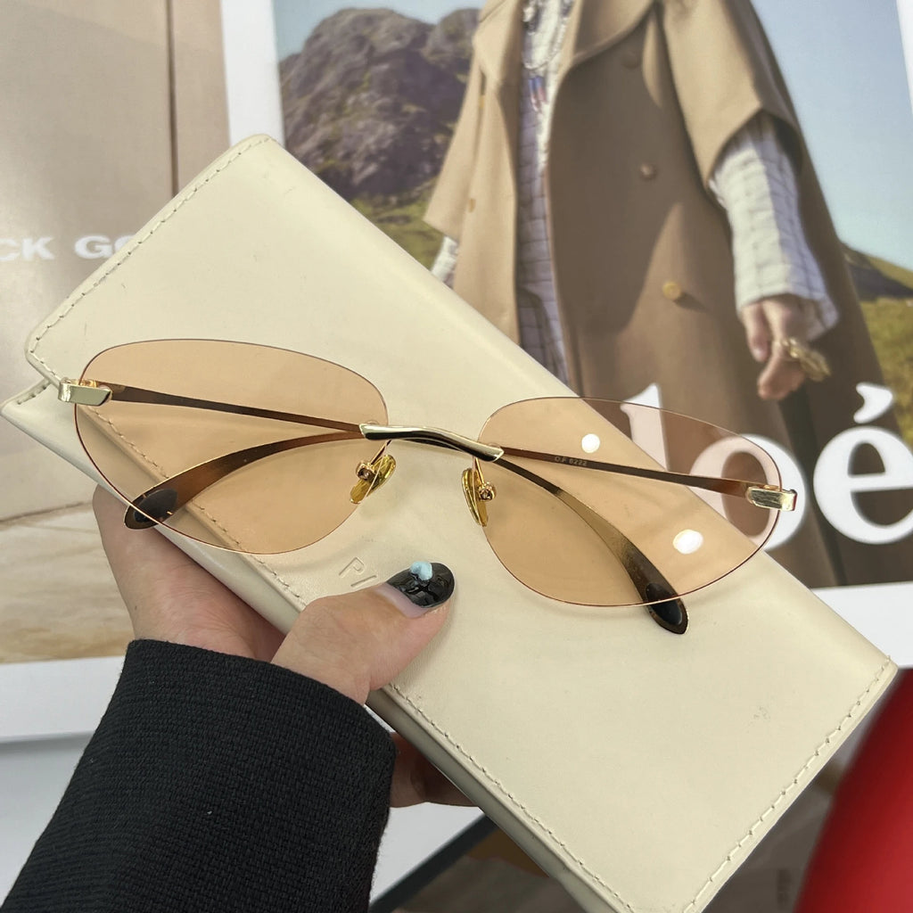 Occhiali da sole senza montatura Y2K da donna Occhiali da sole senza montatura di marca di lusso Futuro stili coreani Cat Eye Occhiali UV400 Occhiali alla moda