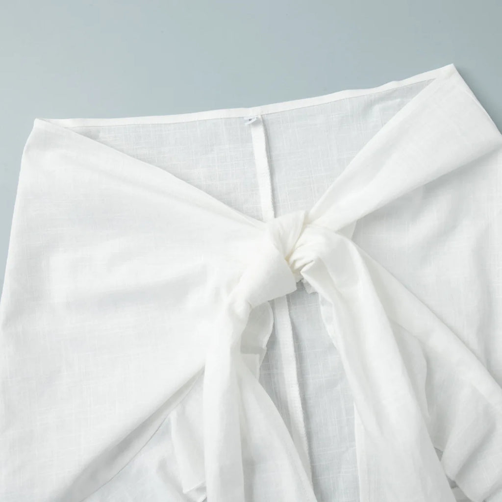 Abito chemisier casual da donna tinta unita con lacci, estivo, con risvolto, maniche lunghe, bottoni, mini abito plissettato, copricostume da spiaggia, outfit per vacanze 2026