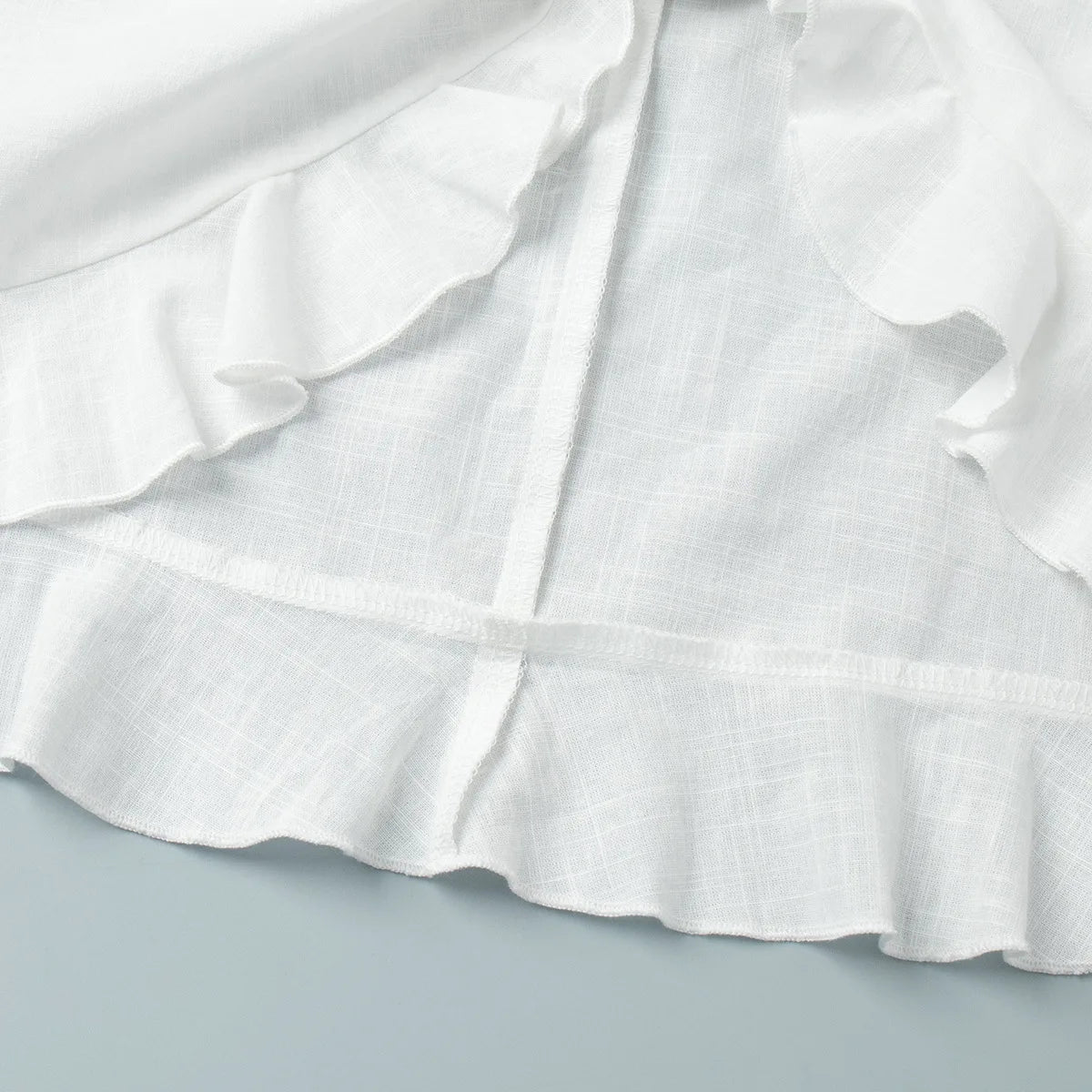 Abito chemisier casual da donna tinta unita con lacci, estivo, con risvolto, maniche lunghe, bottoni, mini abito plissettato, copricostume da spiaggia, outfit per vacanze 2026