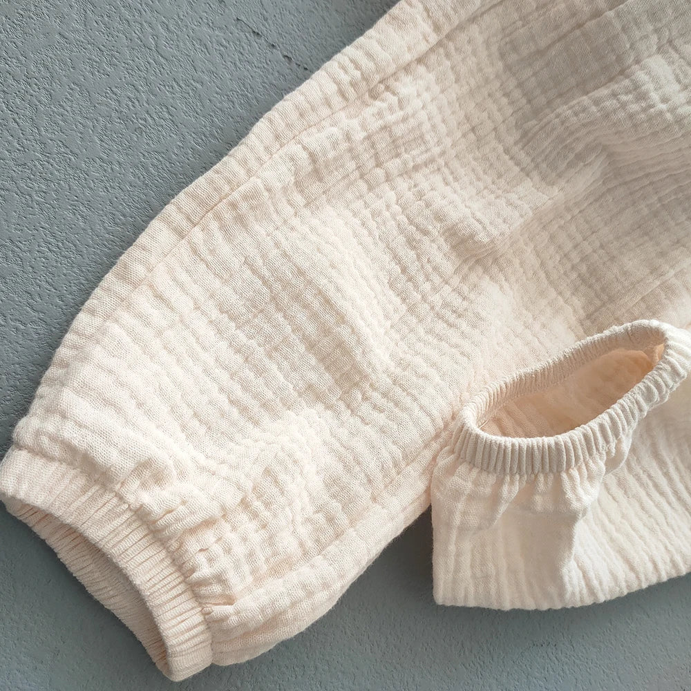 Pantaloni estivi per bambini coreani Pantaloni casual per ragazze Ragazzi in cotone e lino Tinta unita Pantaloni larghi a pieghe Pantaloni Harem a vita alta per ragazze