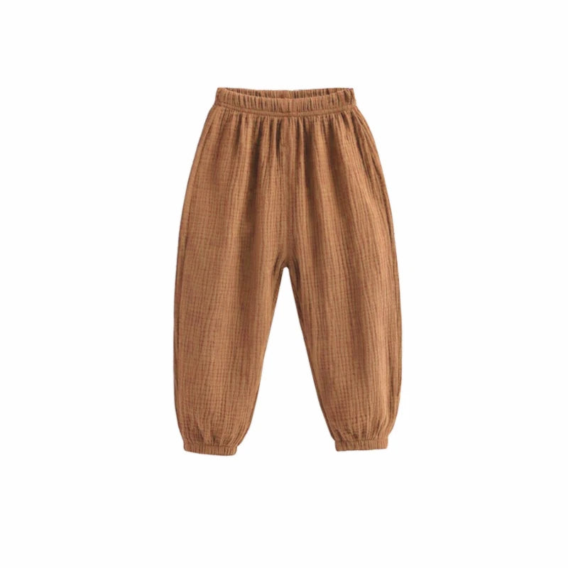 Pantaloni estivi per bambini coreani Pantaloni casual per ragazze Ragazzi in cotone e lino Tinta unita Pantaloni larghi a pieghe Pantaloni Harem a vita alta per ragazze