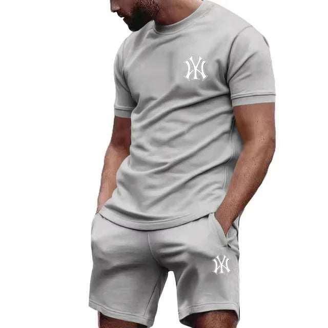 Nuovo set sportivo da uomo 2026 di tendenza: T-shirt a maniche corte e pantaloni per corsa e fitness, ideale per l'estate