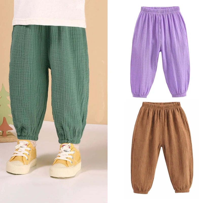Pantaloni estivi per bambini coreani Pantaloni casual per ragazze Ragazzi in cotone e lino Tinta unita Pantaloni larghi a pieghe Pantaloni Harem a vita alta per ragazze