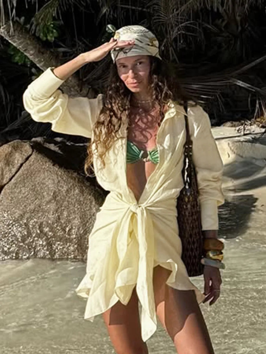 Abito chemisier casual da donna tinta unita con lacci, estivo, con risvolto, maniche lunghe, bottoni, mini abito plissettato, copricostume da spiaggia, outfit per vacanze 2026