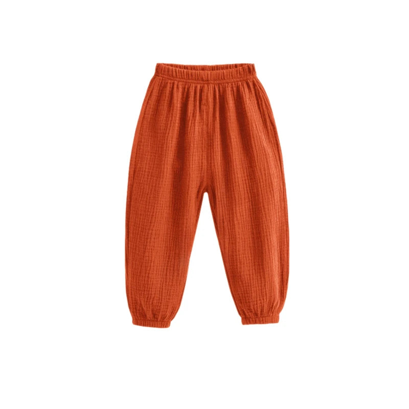 Pantaloni estivi per bambini coreani Pantaloni casual per ragazze Ragazzi in cotone e lino Tinta unita Pantaloni larghi a pieghe Pantaloni Harem a vita alta per ragazze
