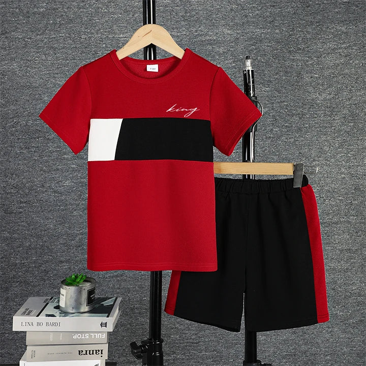 Set di t-shirt e pantaloncini a maniche corte colorblock casual da 2 pezzi per ragazzi, comodi vestiti estivi per bambini